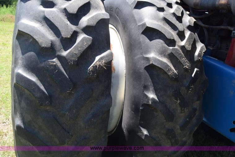 image for item K7323 1997 New Holland 9482 Versatile 4WD tractor