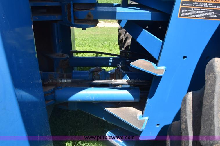 image for item K7323 1997 New Holland 9482 Versatile 4WD tractor