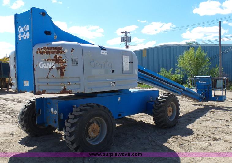 image for item J1662 1999 Genie S60 boom lift