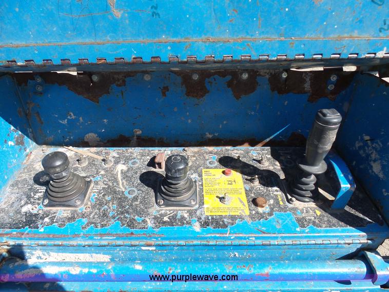 image for item J1662 1999 Genie S60 boom lift