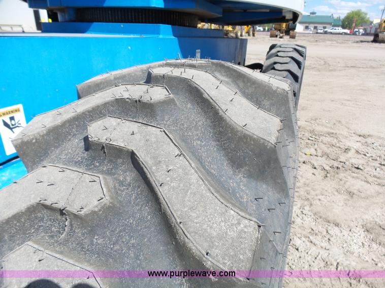 image for item J1662 1999 Genie S60 boom lift