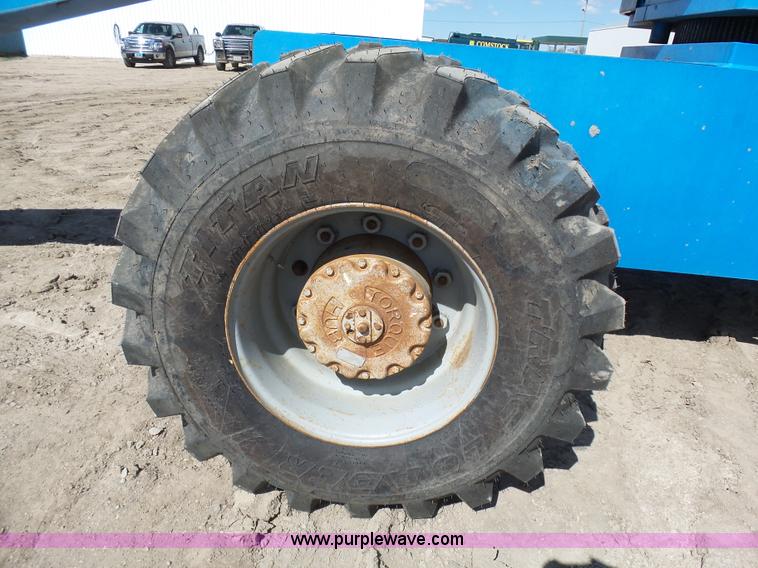 image for item J1662 1999 Genie S60 boom lift