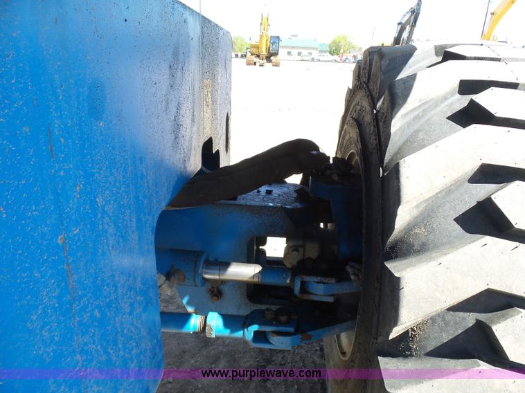 image for item J1662 1999 Genie S60 boom lift