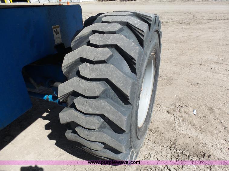 image for item J1662 1999 Genie S60 boom lift