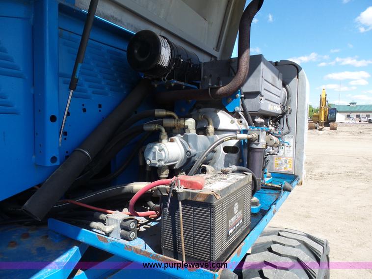 image for item J1662 1999 Genie S60 boom lift