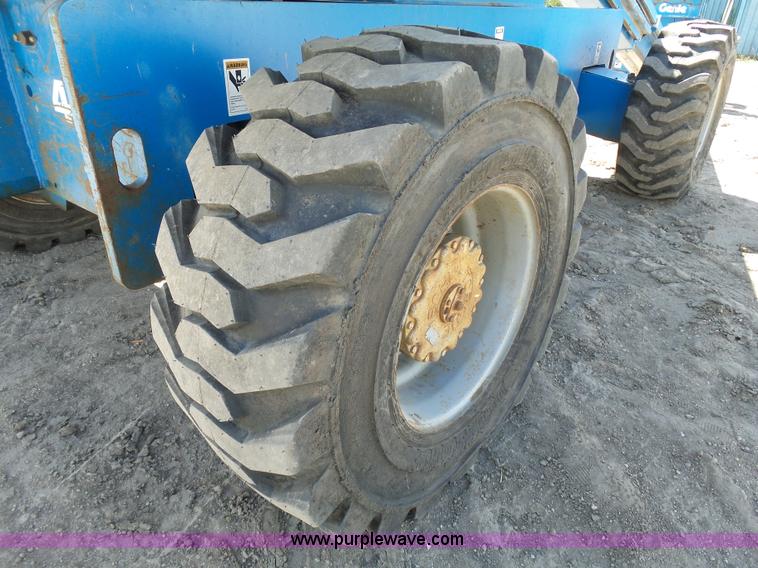 image for item J1662 1999 Genie S60 boom lift