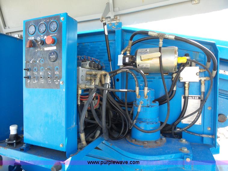 image for item J1662 1999 Genie S60 boom lift