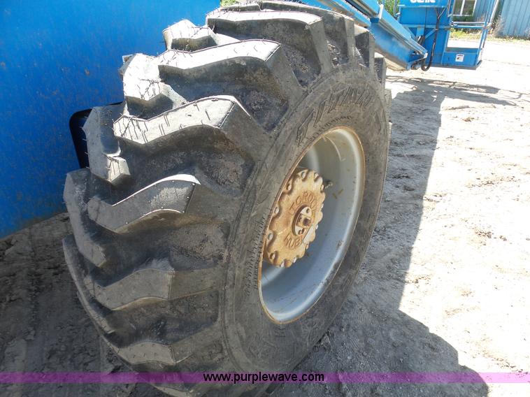 image for item J1662 1999 Genie S60 boom lift