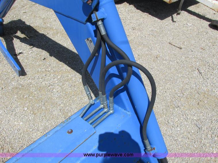 image for item K4718 New Holland 7310 loader