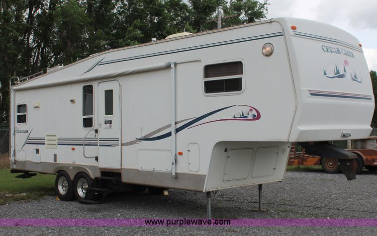 image for item K8852 2000 Cedar Creek camper