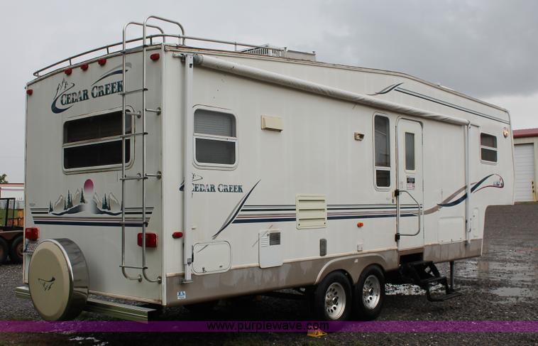 image for item K8852 2000 Cedar Creek camper