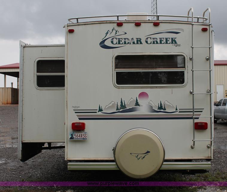 image for item K8852 2000 Cedar Creek camper