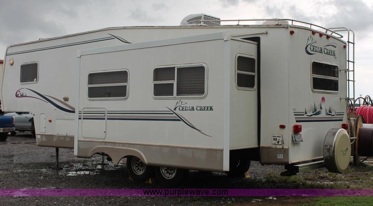 image for item K8852 2000 Cedar Creek camper