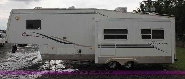 image for item K8852 2000 Cedar Creek camper