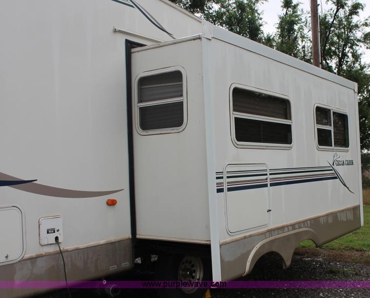 image for item K8852 2000 Cedar Creek camper