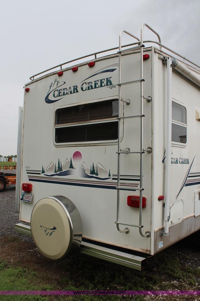image for item K8852 2000 Cedar Creek camper