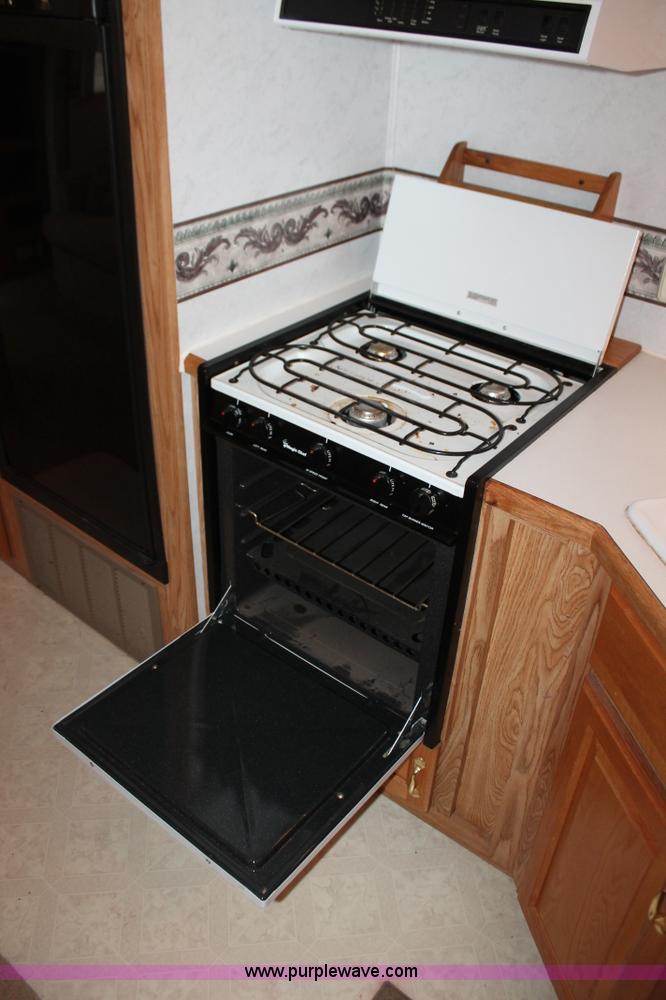 image for item K8852 2000 Cedar Creek camper