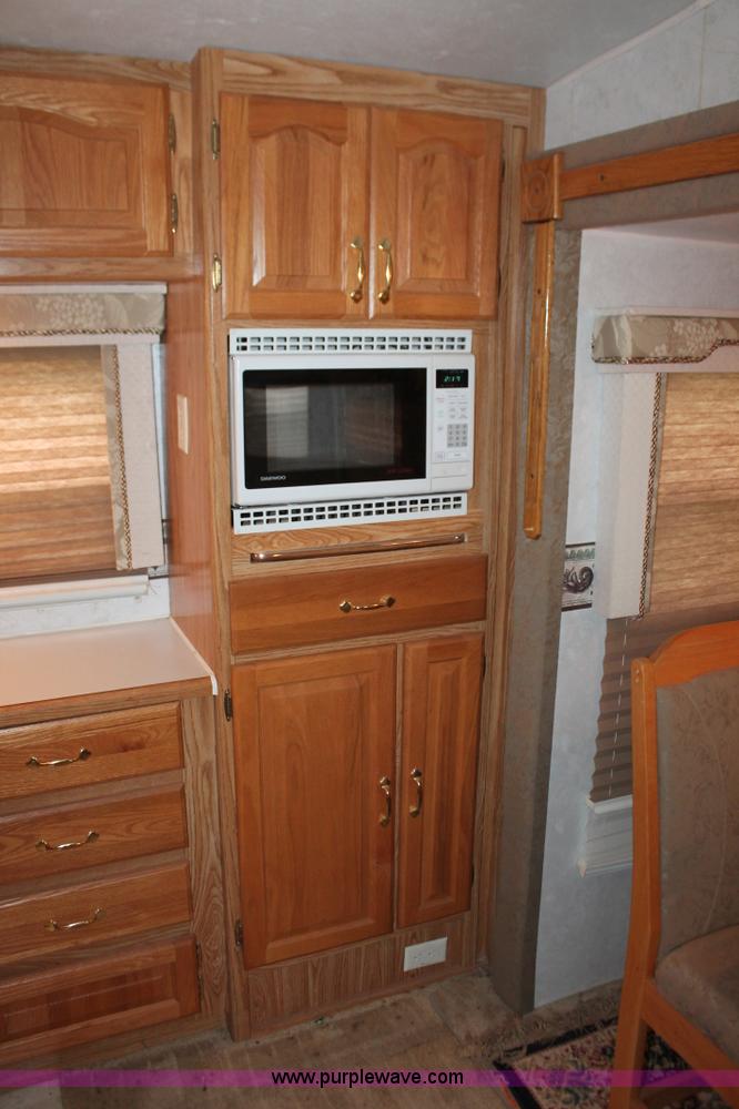 image for item K8852 2000 Cedar Creek camper