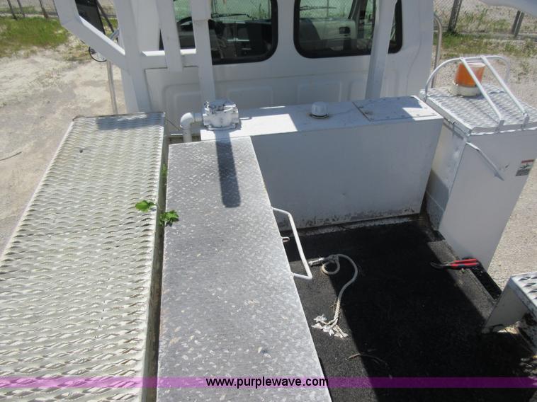 image for item L2830 2002 Sterling M7500 Acterra digger derrick truck