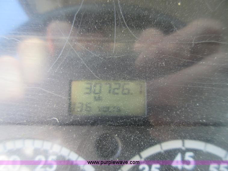 image for item L2830 2002 Sterling M7500 Acterra digger derrick truck