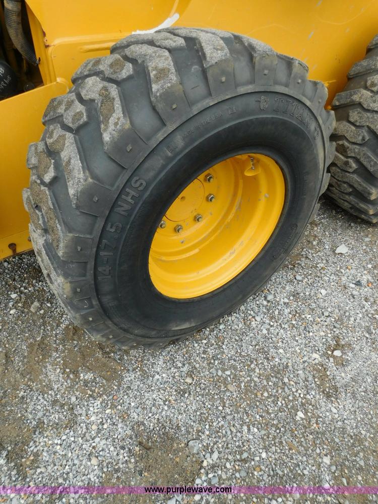 image for item L5849 2011 John Deere 328D skid steer