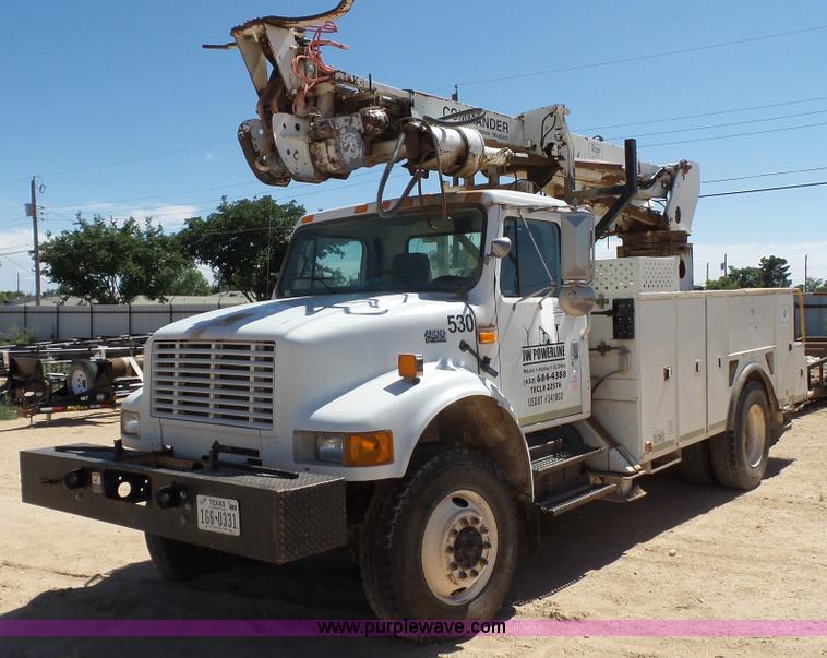image for item L6557 1999 International 4800 digger derrick truck