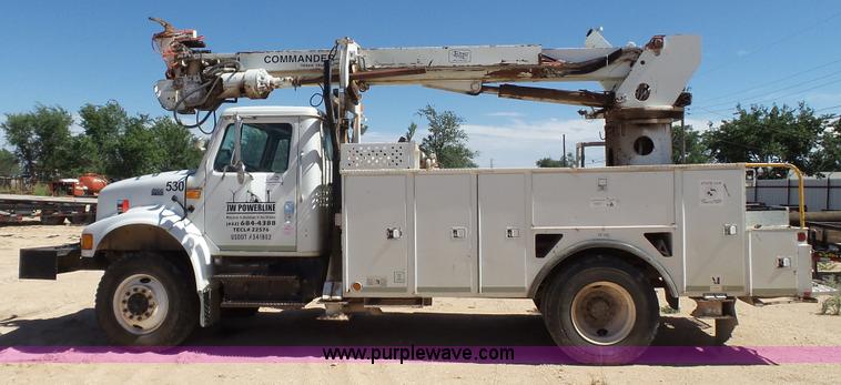 image for item L6557 1999 International 4800 digger derrick truck