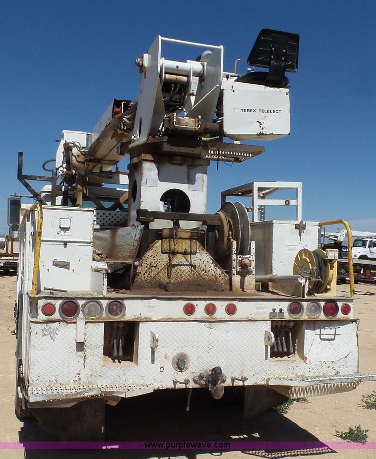 image for item L6557 1999 International 4800 digger derrick truck