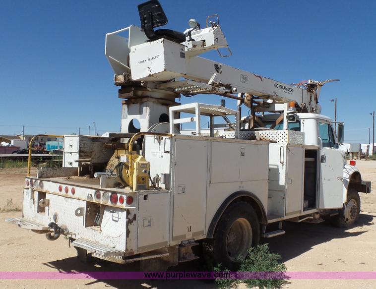 image for item L6557 1999 International 4800 digger derrick truck