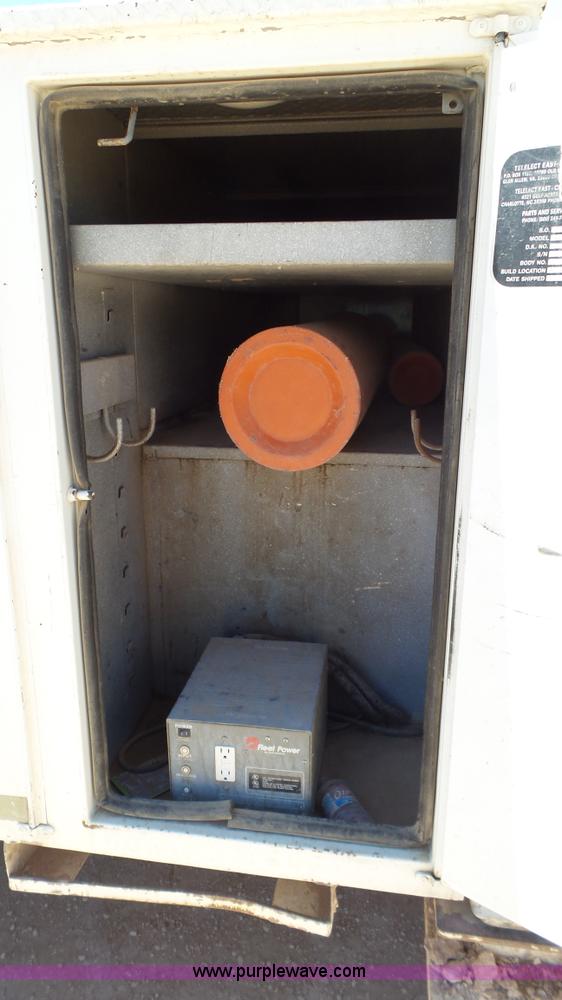 image for item L6557 1999 International 4800 digger derrick truck