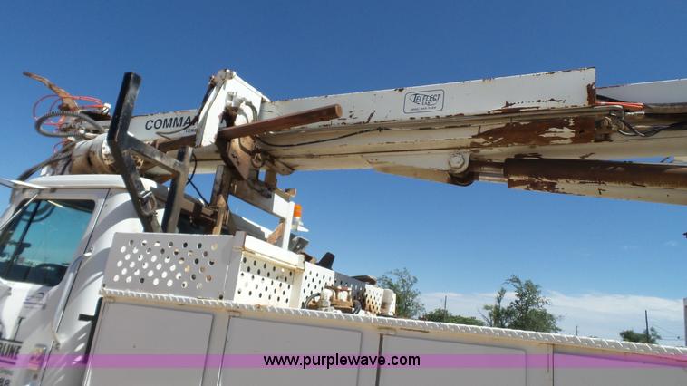 image for item L6557 1999 International 4800 digger derrick truck