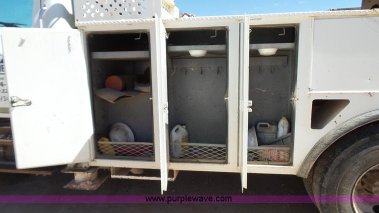 image for item L6557 1999 International 4800 digger derrick truck