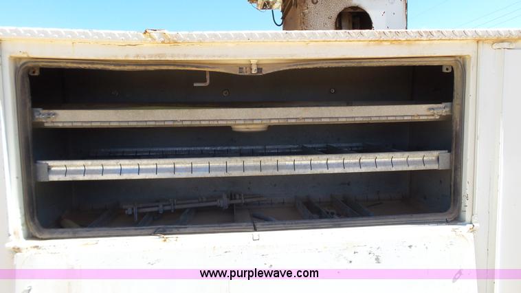 image for item L6557 1999 International 4800 digger derrick truck