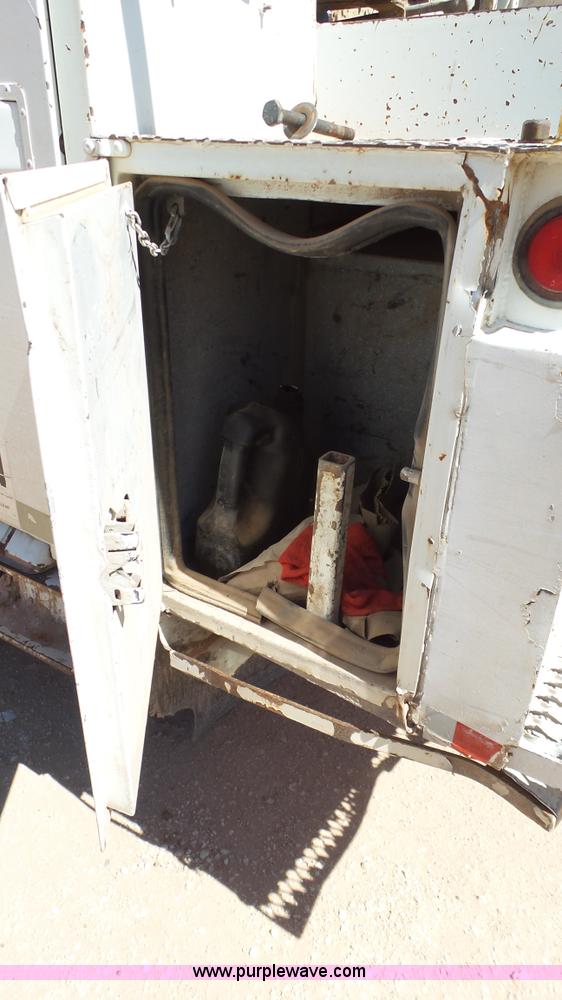 image for item L6557 1999 International 4800 digger derrick truck