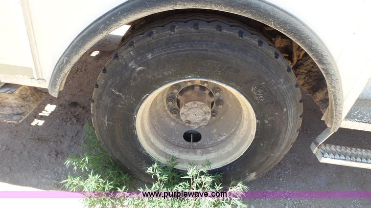 image for item L6557 1999 International 4800 digger derrick truck