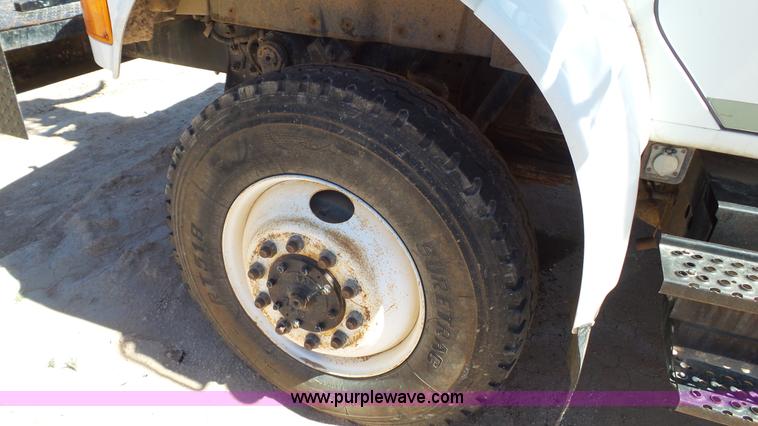 image for item L6557 1999 International 4800 digger derrick truck