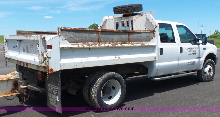 image for item L7052 2002 Ford F450 Super Duty XLT Crew Cab dump bed truck
