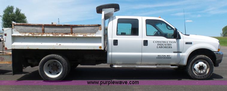 image for item L7052 2002 Ford F450 Super Duty XLT Crew Cab dump bed truck