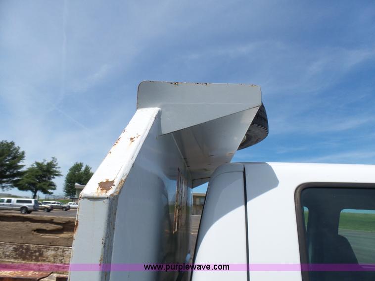 image for item L7052 2002 Ford F450 Super Duty XLT Crew Cab dump bed truck
