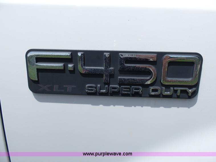 image for item L7052 2002 Ford F450 Super Duty XLT Crew Cab dump bed truck