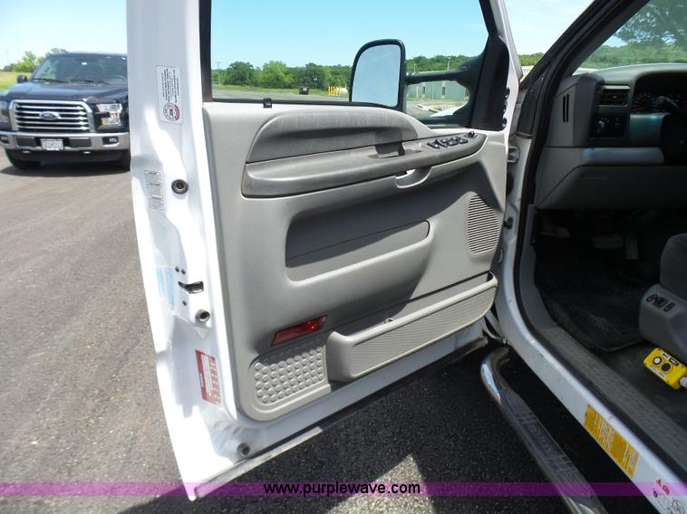 image for item L7052 2002 Ford F450 Super Duty XLT Crew Cab dump bed truck