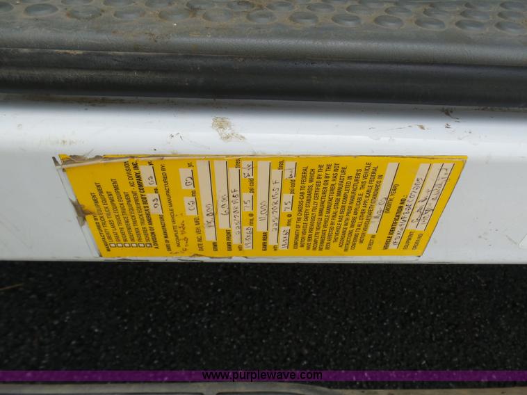 image for item L7052 2002 Ford F450 Super Duty XLT Crew Cab dump bed truck