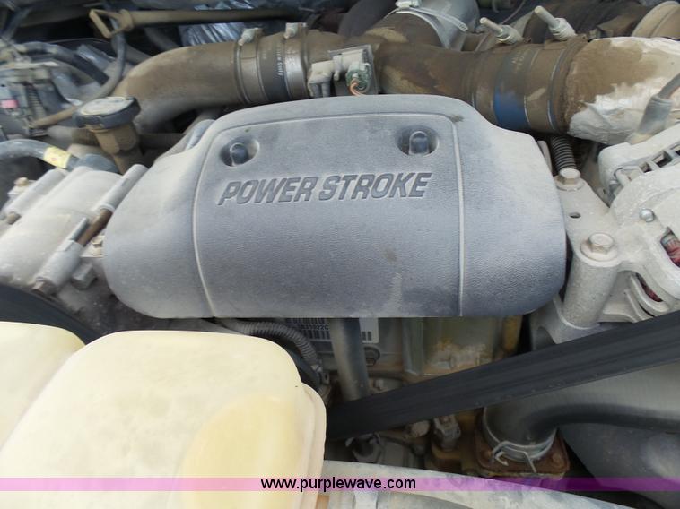 image for item L7052 2002 Ford F450 Super Duty XLT Crew Cab dump bed truck