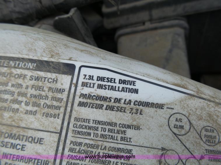 image for item L7052 2002 Ford F450 Super Duty XLT Crew Cab dump bed truck