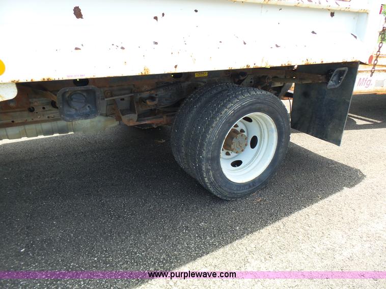 image for item L7052 2002 Ford F450 Super Duty XLT Crew Cab dump bed truck