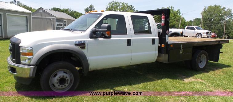 image for item L7062 2008 Ford F550 Super Duty Crew Cab flatbed truck