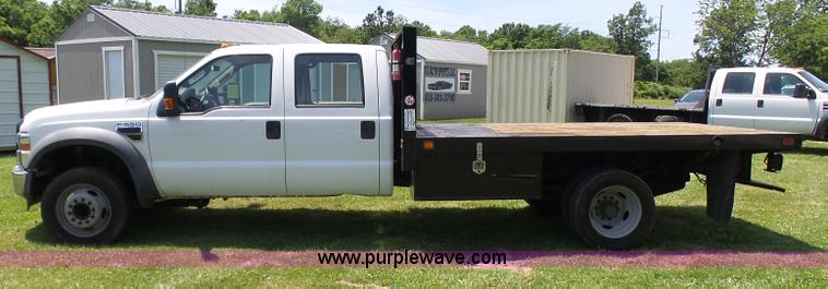 image for item L7062 2008 Ford F550 Super Duty Crew Cab flatbed truck