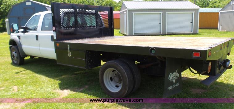 image for item L7062 2008 Ford F550 Super Duty Crew Cab flatbed truck