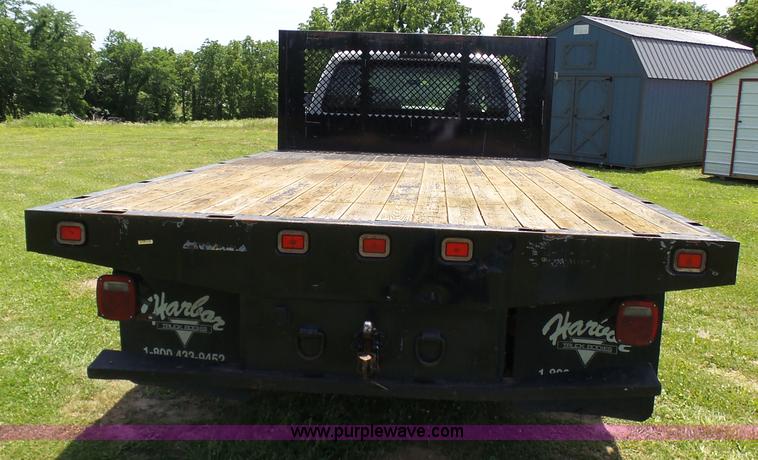 image for item L7062 2008 Ford F550 Super Duty Crew Cab flatbed truck