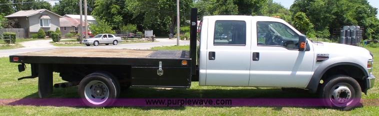 image for item L7062 2008 Ford F550 Super Duty Crew Cab flatbed truck